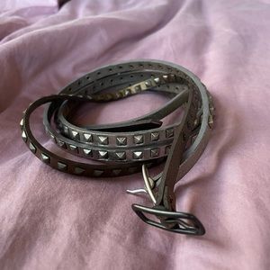 Thin studded silver and bronze belt